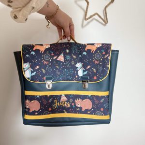 Cartable, simili paon et grenade Adventure